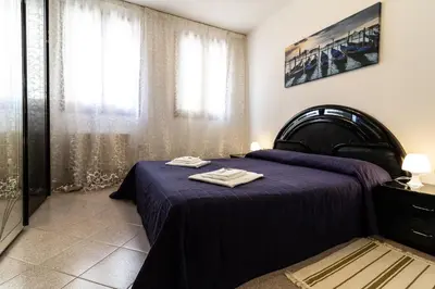 Letto o letti in una camera di Veneziacentopercento Rooms
