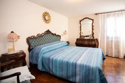 Letto o letti in una camera di Dimora Zaira - Isola di Pellestrina Ve