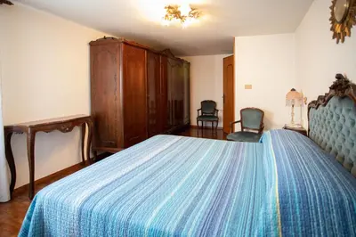Letto o letti in una camera di Dimora Zaira - Isola di Pellestrina Ve