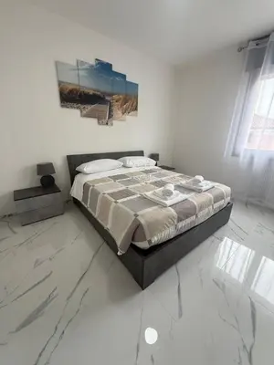 Letto o letti in una camera di Residence La Pace