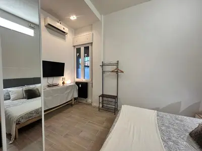 Letto o letti in una camera di Mini Loft - convenient for Venice
