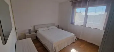 Letto o letti in una camera di Casa Letizia