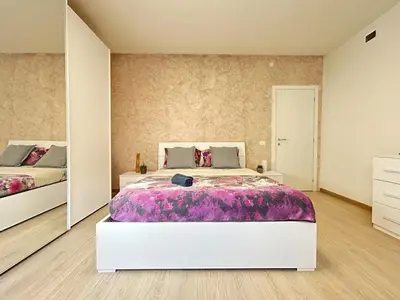 Letto o letti in una camera di Modern Suite 10 min to Venice & Private Parking