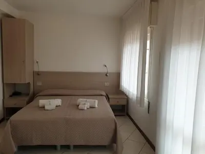 Letto o letti in una camera di Hotel Madison