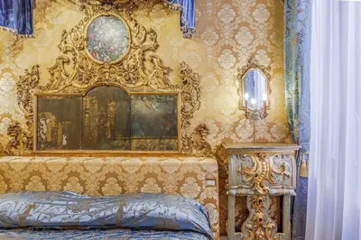 Letto o letti in una camera di Canal View San Marco Rialto - Dogaressa Palace 1872