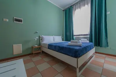 Letto o letti in una camera di Marconi Lodge