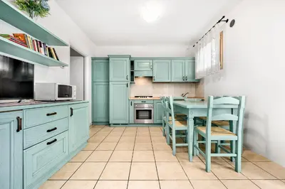 Cucina o angolo cottura di Jesolo Flowers Beach House - Host Solution