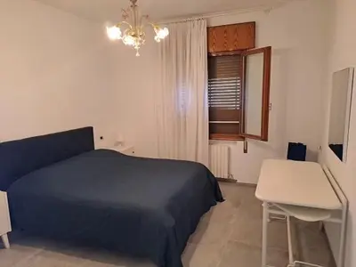 Letto o letti in una camera di Da Marcella