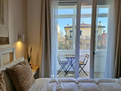 Letto o letti in una camera di Stazione Rooms