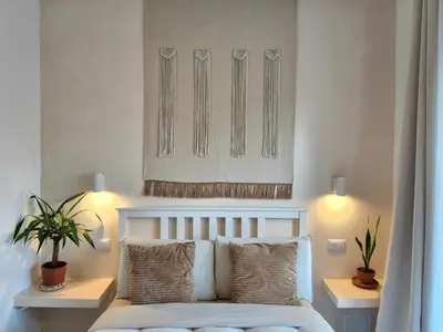 Letto o letti in una camera di Stazione Rooms