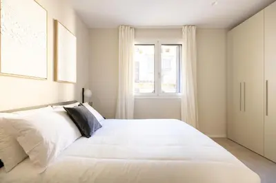 Letto o letti in una camera di PALAZZO CIVIDALE Central Luxury Home