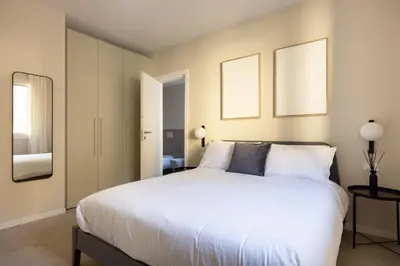Letto o letti in una camera di PALAZZO CIVIDALE Central Luxury Home
