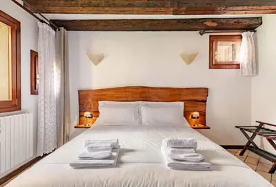 Letto o letti in una camera di Murano Glass Residence