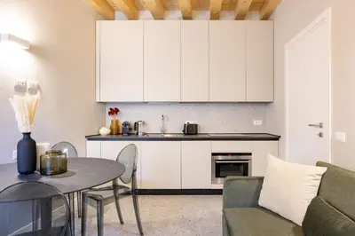 Cucina o angolo cottura di PALAZZO CIVIDALE Central Luxury Apartment B