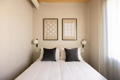 Letto o letti in una camera di PALAZZO CIVIDALE Central Luxury Apartment B