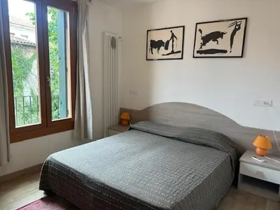 Letto o letti in una camera di Ca' Ruffoni Terrace
