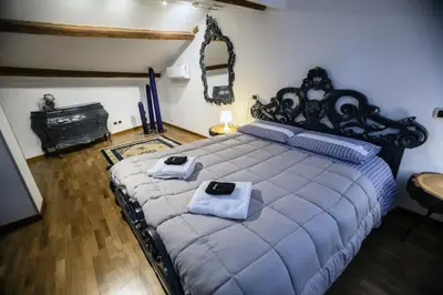 Letto o letti in una camera di Residenza agli Ospedali