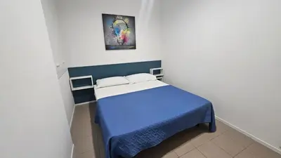 Letto o letti in una camera di Villa Veranda Quadrilocale
