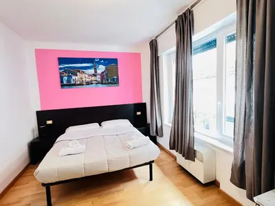 Letto o letti in una camera di L'affitta Camere di Venezia