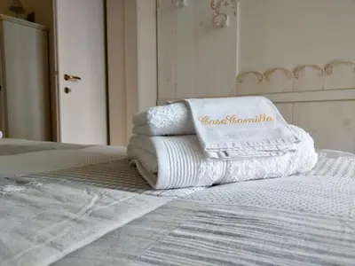 Letto o letti in una camera di Casa Camilla City