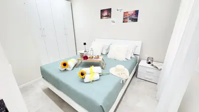 Letto o letti in una camera di Casa Serenissima by Ca-Sa Check