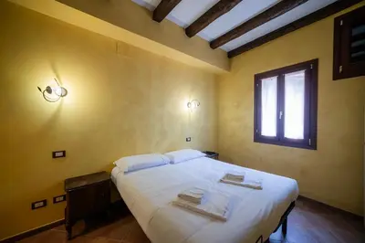 Letto o letti in una camera di Secret Garden - comfortable and central
