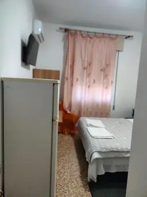 Letto o letti in una camera di Bella cina