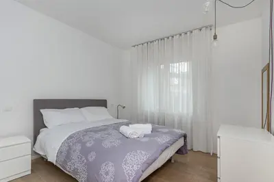Letto o letti in una camera di GuestHost - Charming Apartment in Venezia Mestre