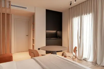 Letto o letti in una camera di Alma Suites