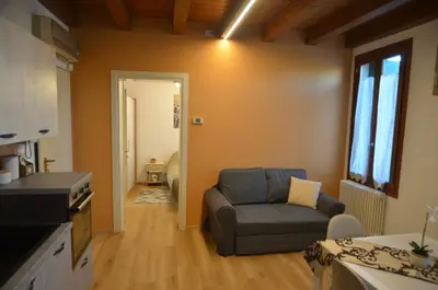 Area soggiorno di Ca Vellione cozy apt Noale