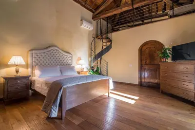 Letto o letti in una camera di Ca' Salva Rustic Charme