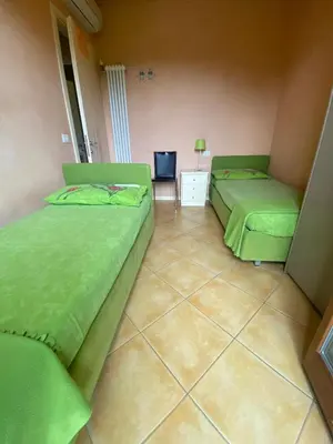 Letto o letti in una camera di App4rent - GolfClubJesolo Family Apartment