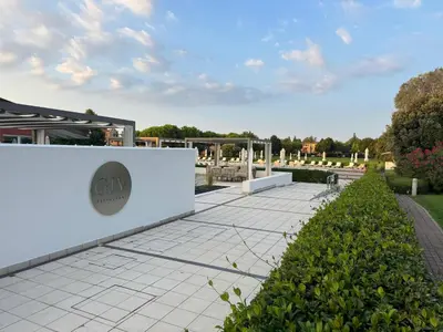 Giardino di App4rent - GolfClubJesolo Family Apartment