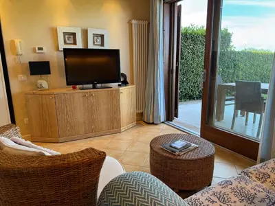 TV o dispositivi per l'intrattenimento presso App4rent - GolfClubJesolo Family Apartment