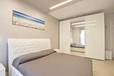 Letto o letti in una camera di Le Residenze Mediterranee Apartments