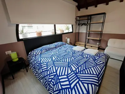 Letto o letti in una camera di Charming loft apartment 15m to Venice