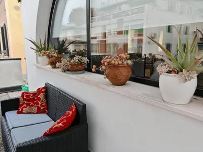 Area soggiorno di Charming loft apartment 15m to Venice