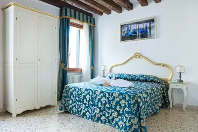 Letto o letti in una camera di Al Mascaron Ridente