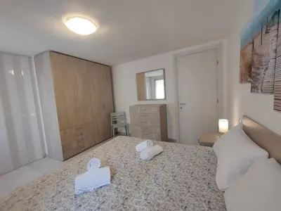 Letto o letti in una camera di Novella Apartment