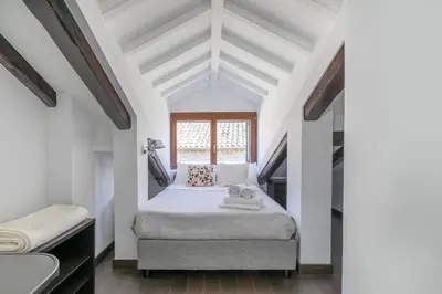 Letto o letti in una camera di Old Town Nest by WelcHome