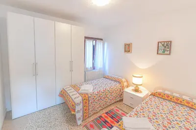 Letto o letti in una camera di Ca' Botera