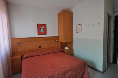 Letto o letti in una camera di Hotel Real