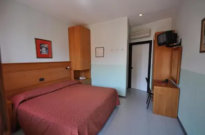 Letto o letti in una camera di Hotel Real