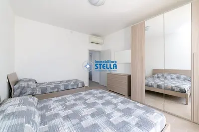 Letto o letti in una camera di Condominio Vicenza
