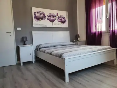 Letto o letti in una camera di Alghe Rosse