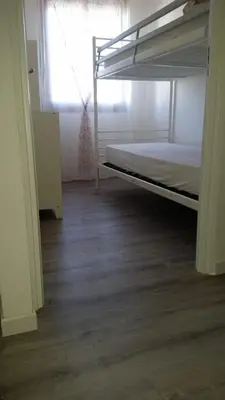 Letto o letti in una camera di Alghe Rosse