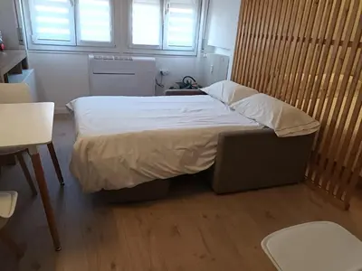 Letto o letti in una camera di Campari Home - 15 min da Venezia - Tram diretto