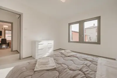 Letto o letti in una camera di Dauli Suite - tra Venezia e Padova & Parcheggio