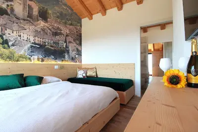 Letto o letti in una camera di Villa Montello Pool, Jacuzzi, Ac, Wifi, Treviso