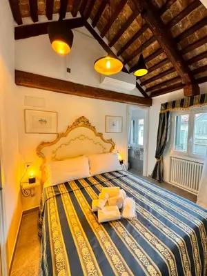 Letto o letti in una camera di Piccolo Paradiso